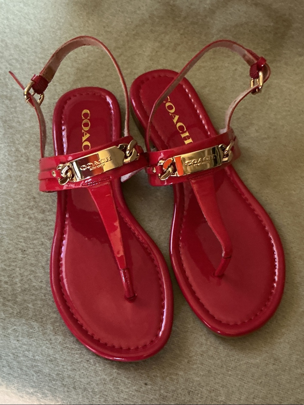 Coach Red Patent T-Strap Sandals with Gold Chain Plaque